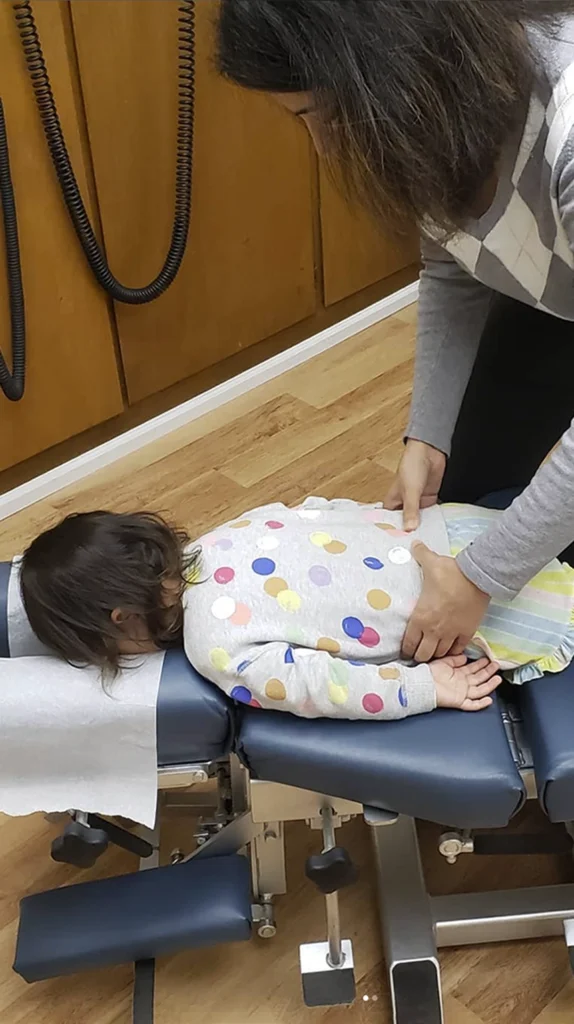 chiropractor-treating-child