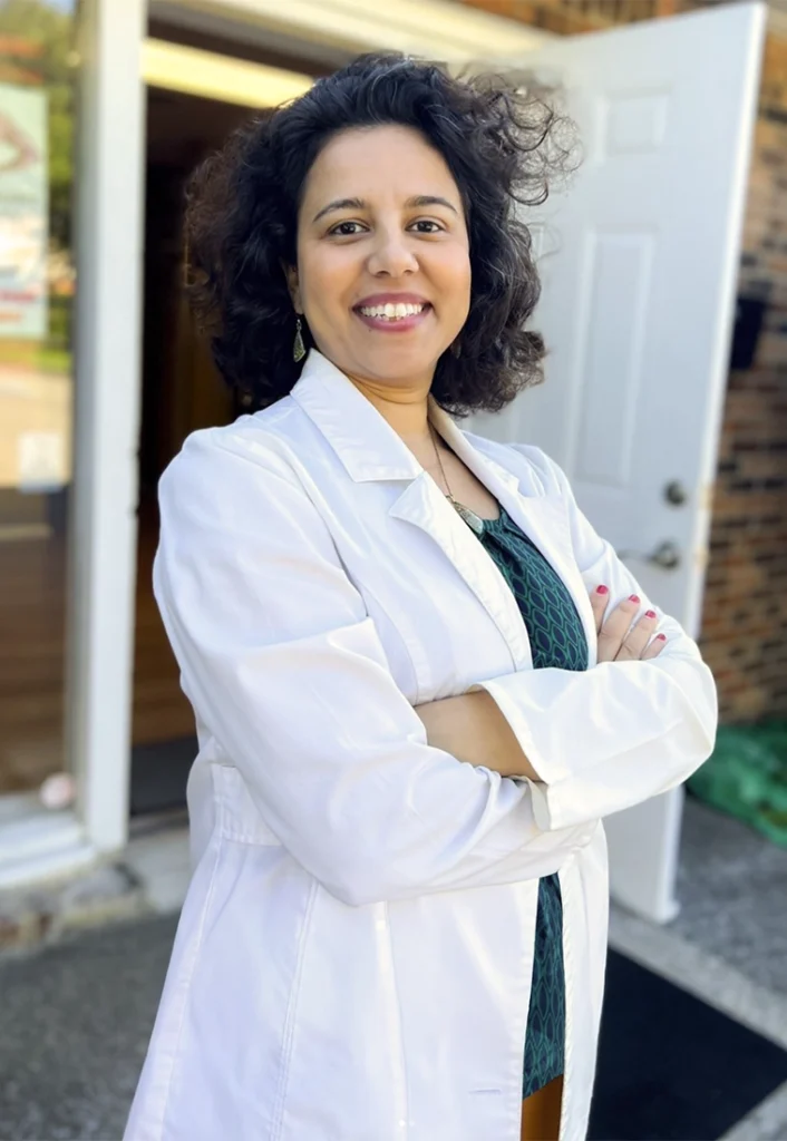 dr-alae-rabiei-chiropractor standing outside office